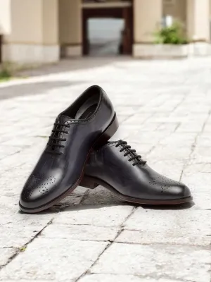 Noir Crest — Perforated Wholecut Oxford